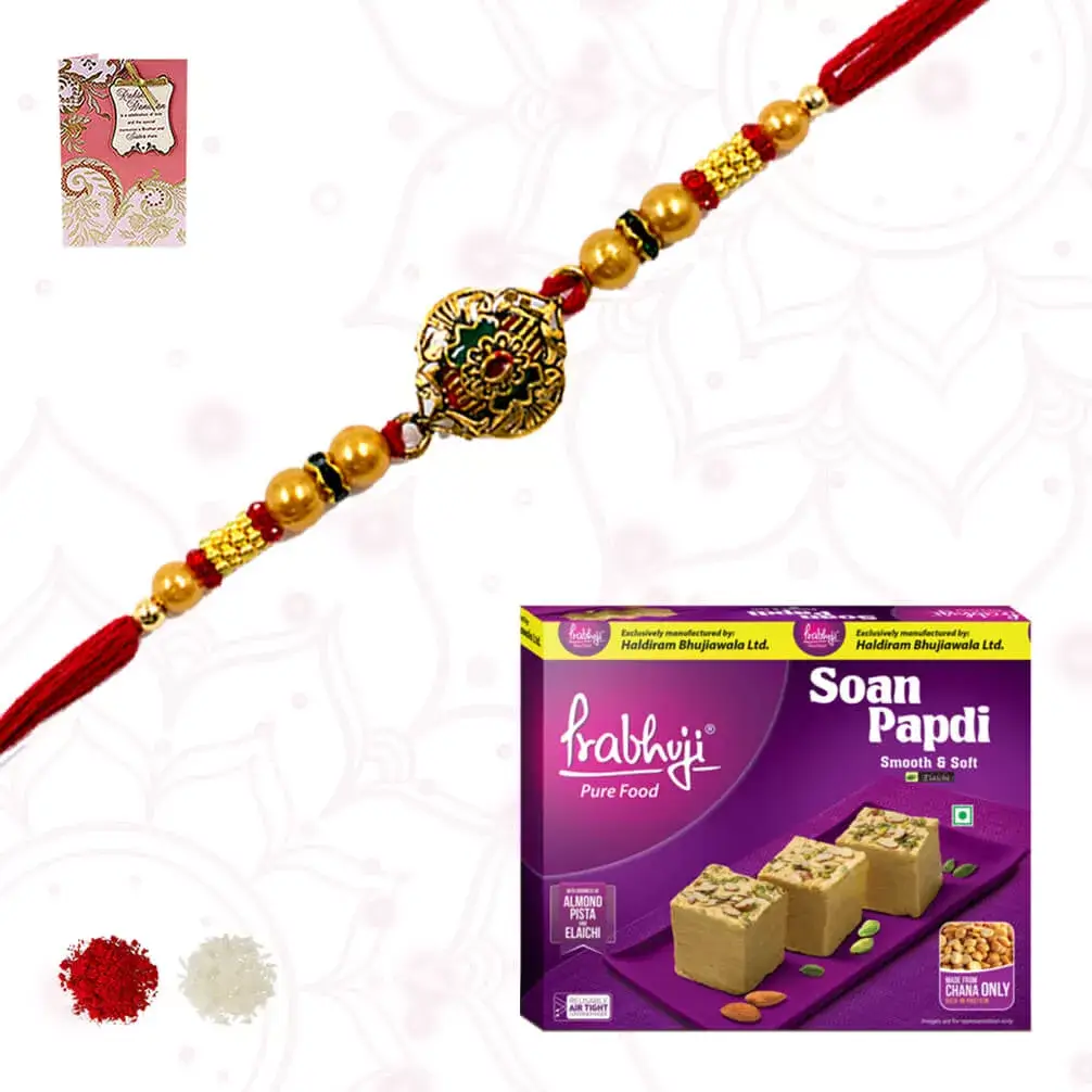 1 pack of Soan Papdi with 1 Fancy Rakhi