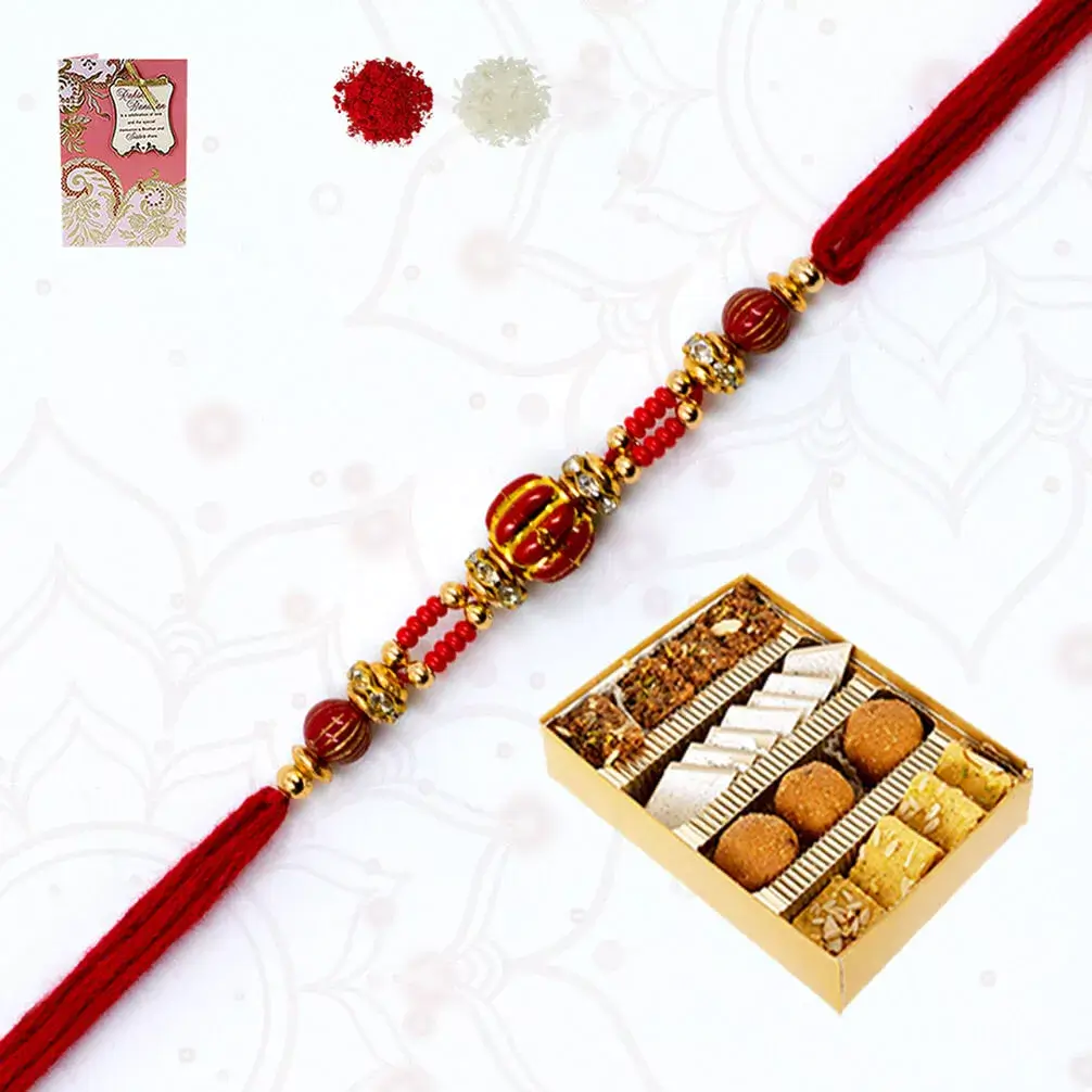 One Rudraksh rakhi with Assorted sweets and 1 Designer puja thali